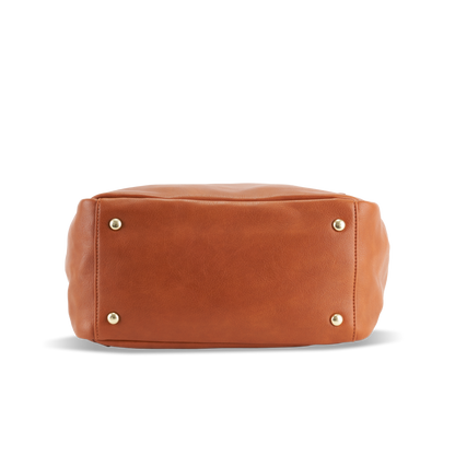 Bottom view of Florence diaper bag showing metal studs for improved durability