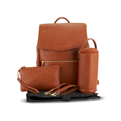 Florence tan nappy bag with accessories including change mat, bottle insulator, makeup pouch and stroller straps