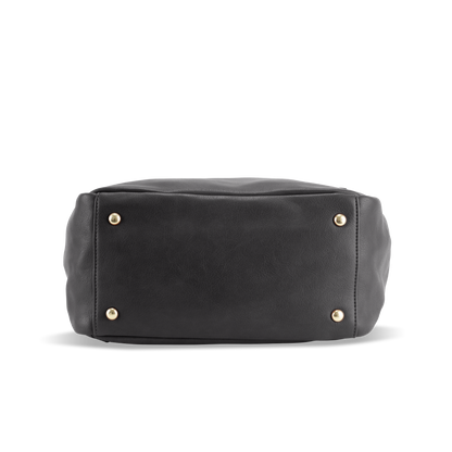 Bottom view of Florence black diaper bag showing metal studs for improved durability