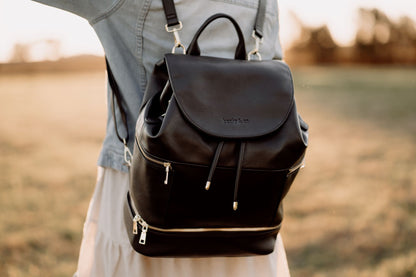 Detail of premium hardware and black vegan leather on Siena Diaper Bag